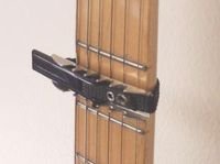 A basic guitar capo