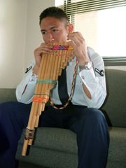 Playing the zampona, an Inca instrument and type of pan pipes.