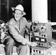 Bing Crosby with the first US manufactured audio tape recorder, The Ampex Model 200, which was first used to record his radio show on April 25, 1948.