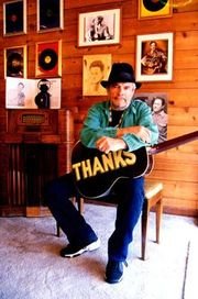 Merle Haggard with guitar