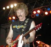 Lead Singer Tom Johnston performing with the Doobie Brothers at a concert in 2002